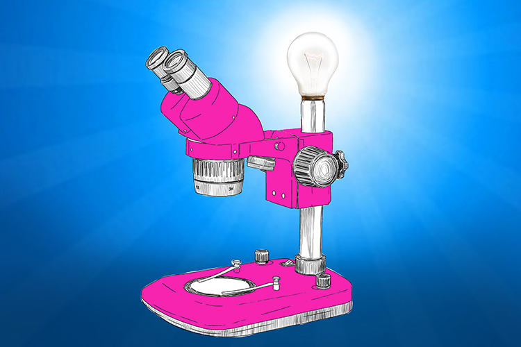 Image of a microscope with a bulb on top depicting a microscope that uses visible light